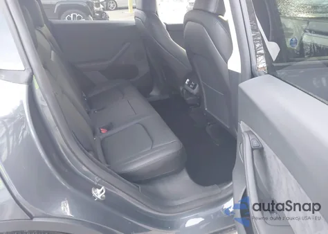 2023 Tesla Model Y Awd/Long Range Dual Motor All-Wheel Drive z USA, uszkodzony, nr VIN 7SAYGDEE5PA125274